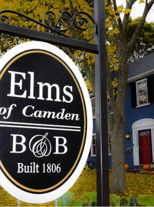 Elms of Camden B&B sign in front of building